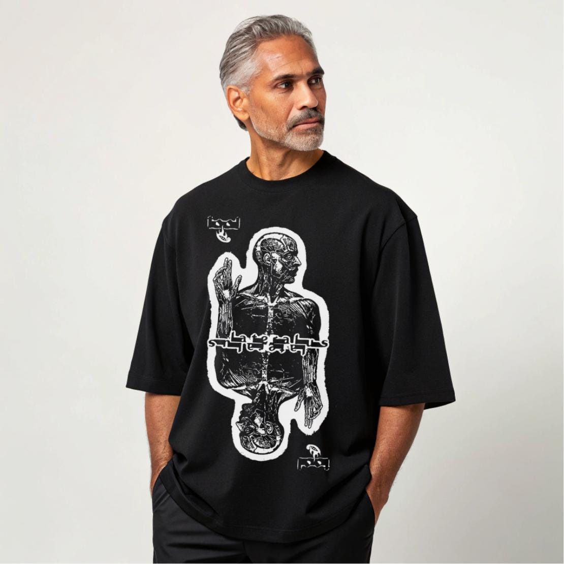 Show off your love for iconic rock/metal music with this striking album-inspired t-shirt. The detailed graphic design brings bold, artistic energy to your wardrobe. Perfect for music enthusiasts who appreciate album artwork and unique band-inspired fashion! 🎸🔥 #RockTee #MetalTShirt #AlbumArt #MusicMerch